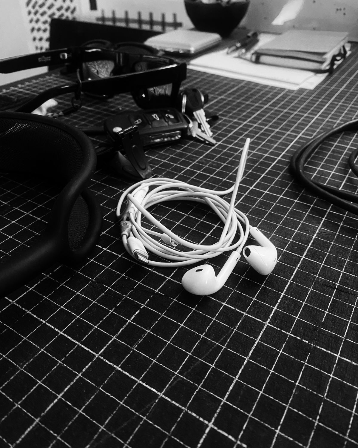 Worktable with cables, headphones and tools