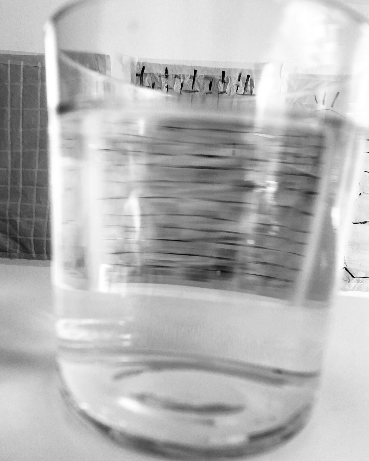 Glass of water photographed in monochrome